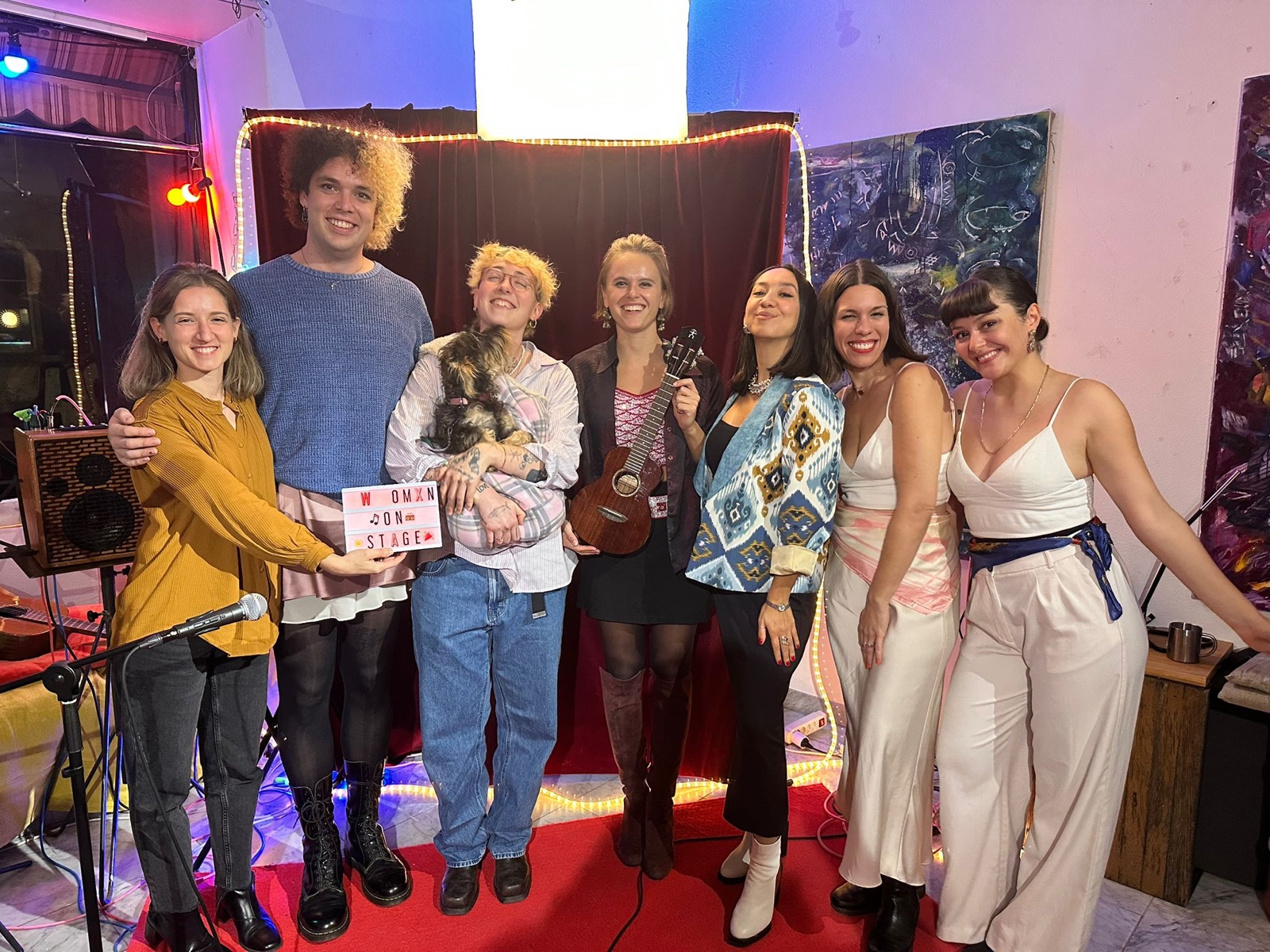 Womxn on Stage — cast holding the Womxn on Stage sign at Ekstase, Zurich
