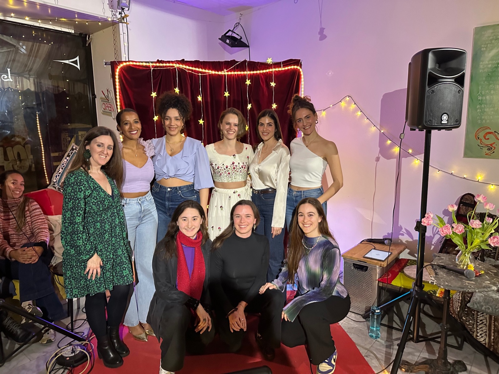 Womxn on Stage — cast portrait in front of the starlit red curtain at Ekstase, Zurich