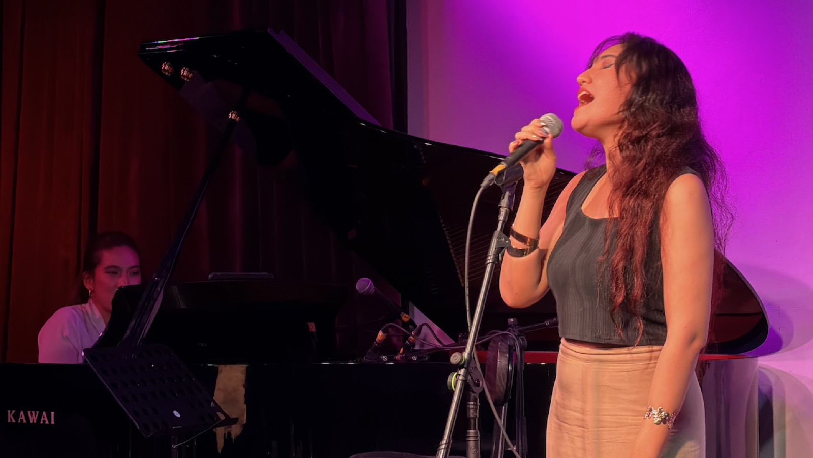 Womxn on Stage — performer singing beside the piano at Bobo KL, Kuala Lumpur